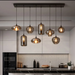 2025-smoke-grey-glass-ball-8xe27-pendant-light-nordic-modern-kitchen-island-restaurant-lighting-mega-lighting-south-africa
