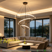 3-ring modern gold chandelier with acrylic shades, adjustable height, suspended above a dining table in warm white glow.
