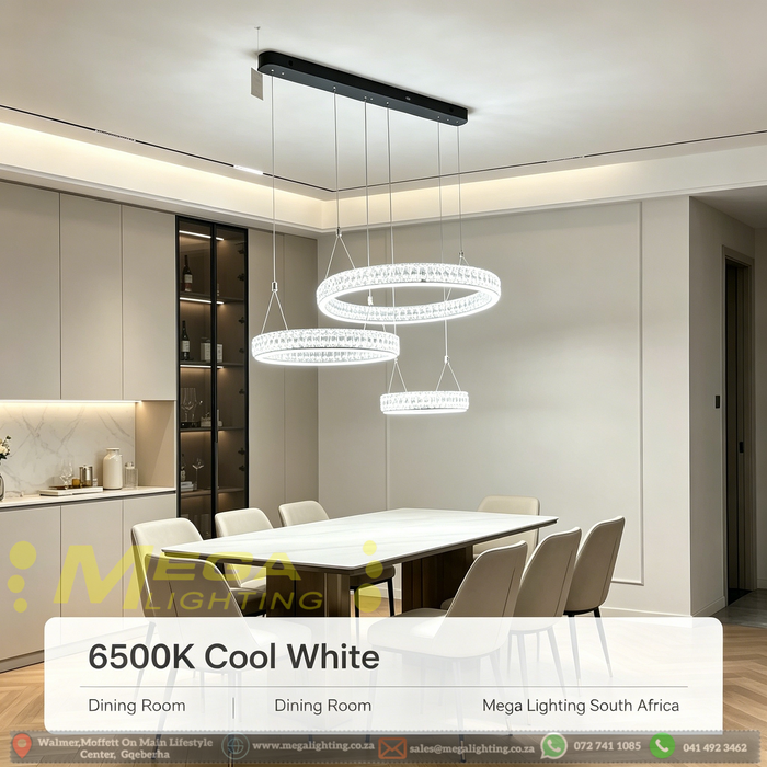 3-tier suspended circle crystal LED chandelier with 300mm, 400mm and 500mm crystal rings, warm glow in a modern dining room.