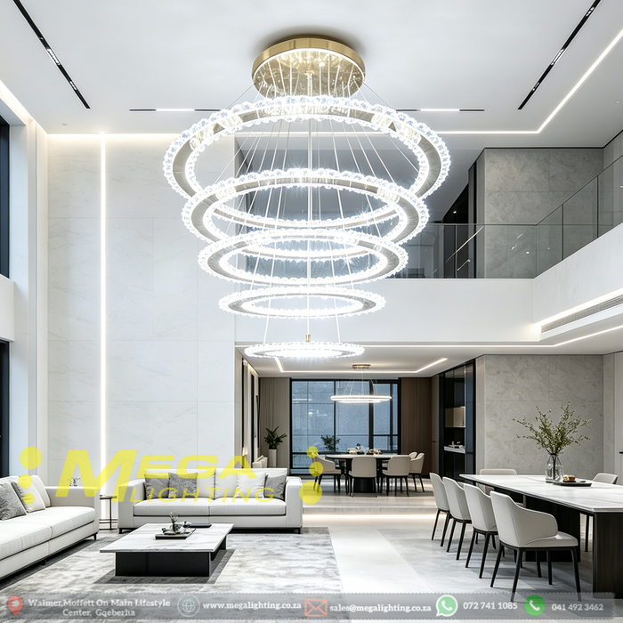 5-ring white LED pendant chandelier with cascading 30-60cm rings, warm glow above a modern dining table.