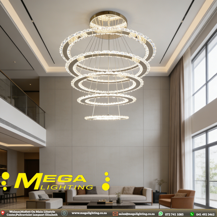 5-ring white LED pendant chandelier with cascading 30-60cm rings, warm glow above a modern dining table.