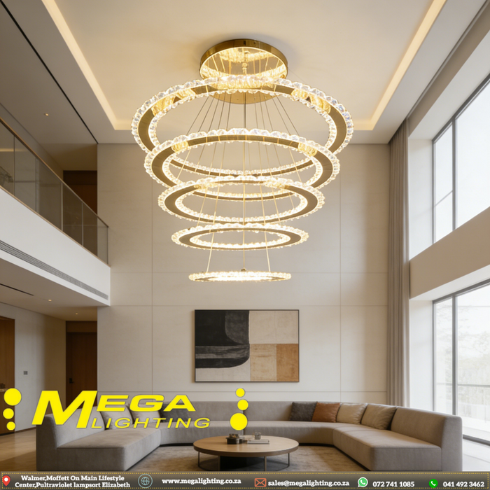 5-ring white LED pendant chandelier with cascading 30-60cm rings, warm glow above a modern dining table.
