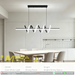 54W LED twirl spiral linear chandelier with twisted spiral light strip, 1m length, warm glow above a modern dining table.