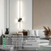 60cm matte black linear LED wall light installed on a living room wall, emitting warm white light – Mega Lighting