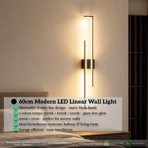 Modern 60cm black linear LED wall light installed on a bedroom wall, emitting warm white light – Mega Lighting
