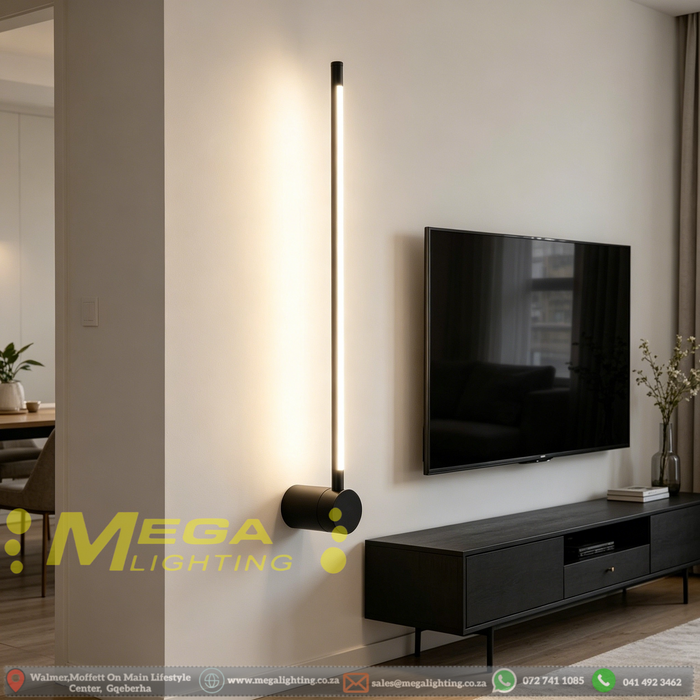 Minimalist 1.6cm thin profile LED wall sconce with round base, mounted beside a home office desk – Mega Lighting