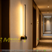 Minimalist 1.6cm thin profile LED wall sconce with round base, mounted beside a home office desk – Mega Lighting
