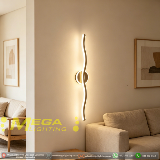 60cm black wavy LED wall light installed on a living room wall, emitting warm white light – Mega Lighting