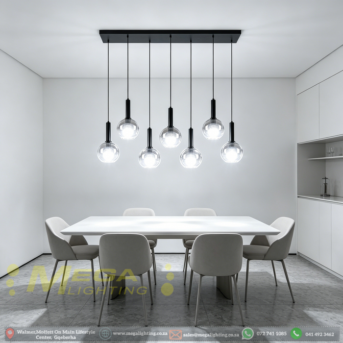 7-light smoke gradient glass pendant light with matte black frame, linear design, warm glow above a dining table