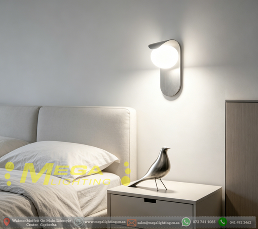 Modern bird design LED wall sconce with curved silhouette, matte black finish, soft warm glow for bedroom bedside lighting.