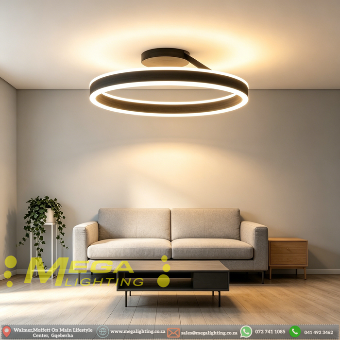 Black circular LED ceiling light with adjustable CCT (3000K/4000K/6500K) mounted in a modern dining room, minimalist design, 50cm diameter, South Africa.