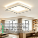50x50cm MEGA LIGHTING modern layered wavy LED ceiling light with warm white lighting, three-tiered wavy frame, installed in a cozy living room setting
