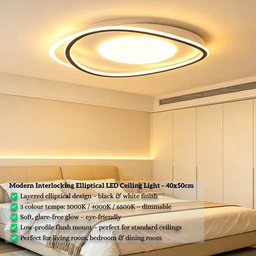 40x50cm MEGA LIGHTING modern interlocking elliptical LED ceiling light with 3000K warm light, matte black and white finish, installed in a minimalist bedroom setting
