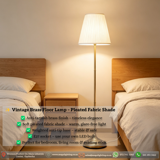 Vintage brass floor lamp with pleated fabric shade, classic standing light in a warm bedroom corner setting in South Africa